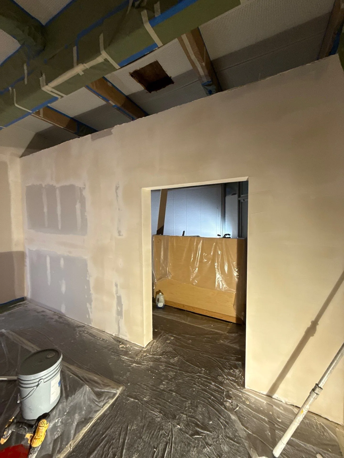Drywall mudding and taping in commercial space