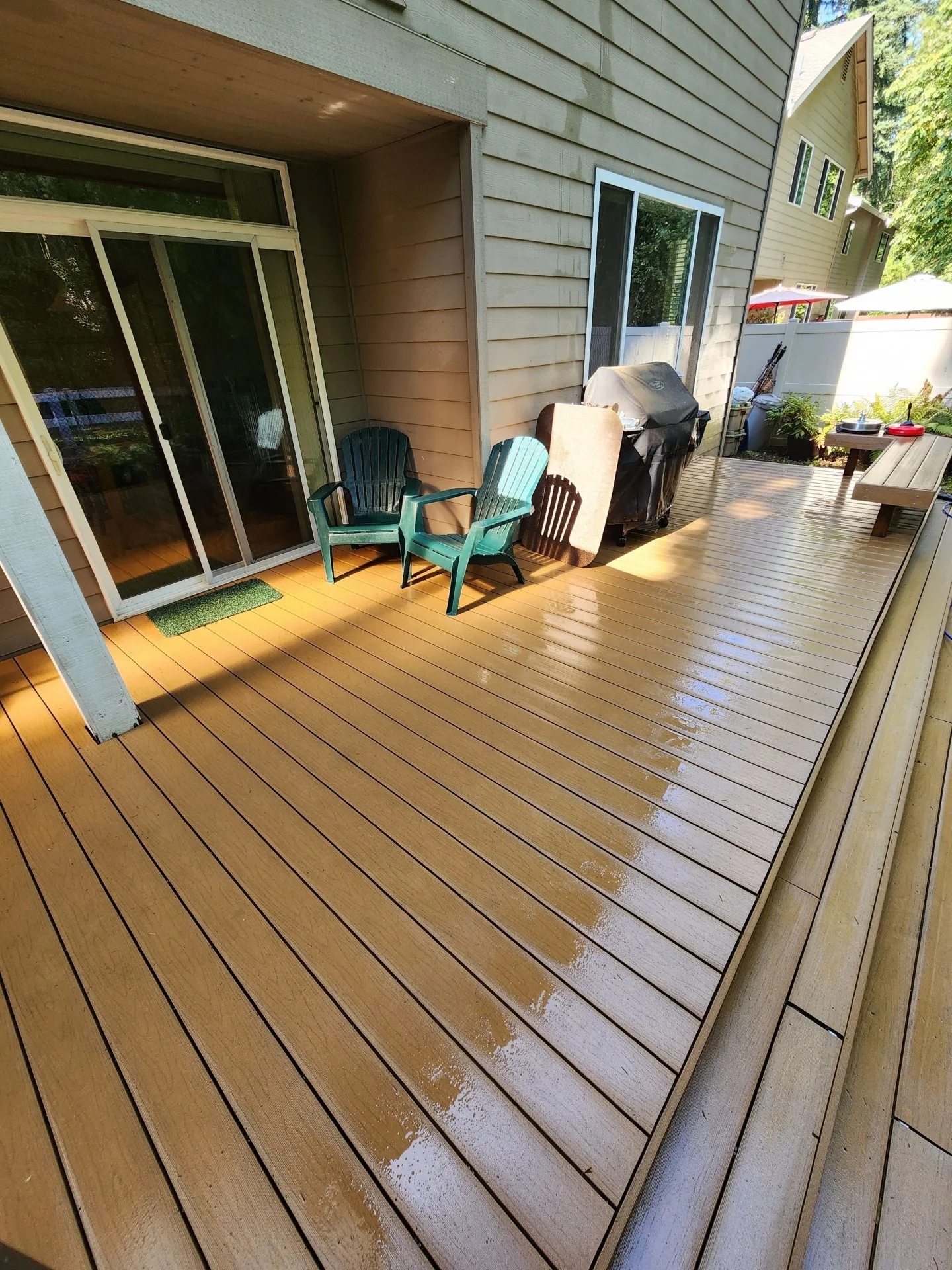 Freshly pressure washed deck with clean finish in Bothell WA